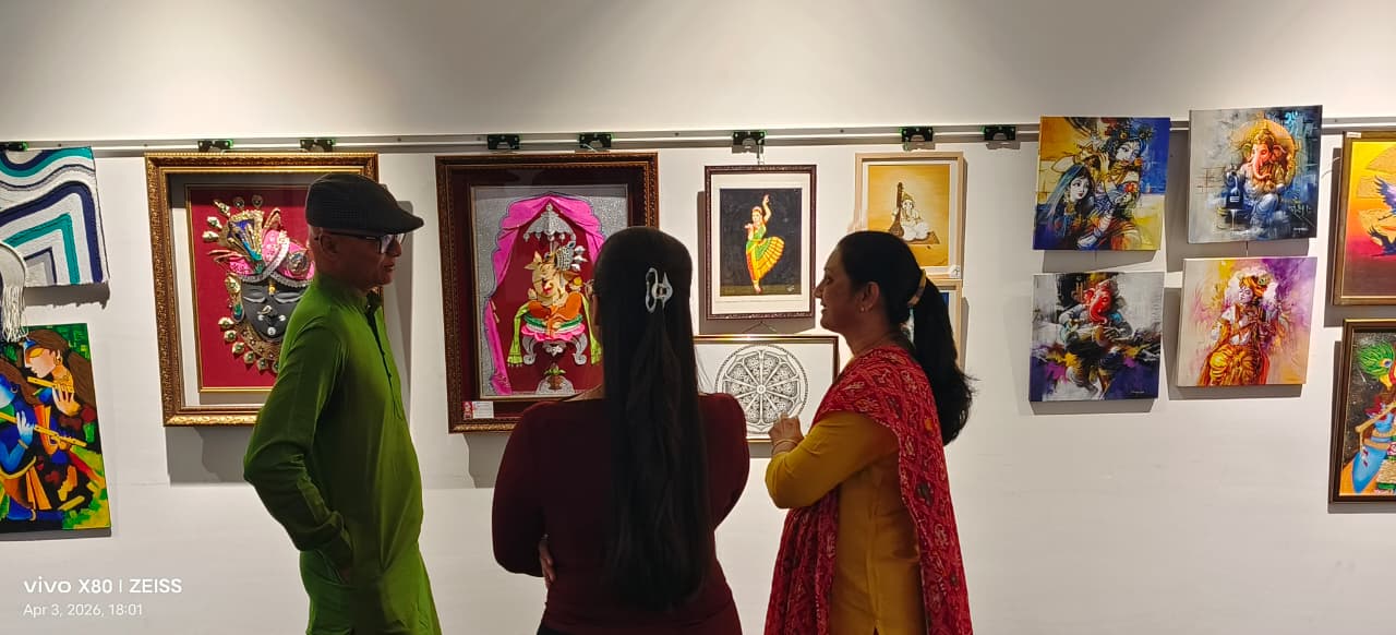 Visitors engaging with Artace artworks during the Trishakti-hosted exhibition in Gujarat