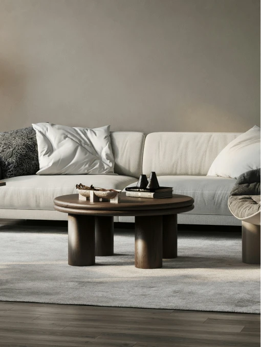 Modern living room with beige sofa and round wooden coffee table