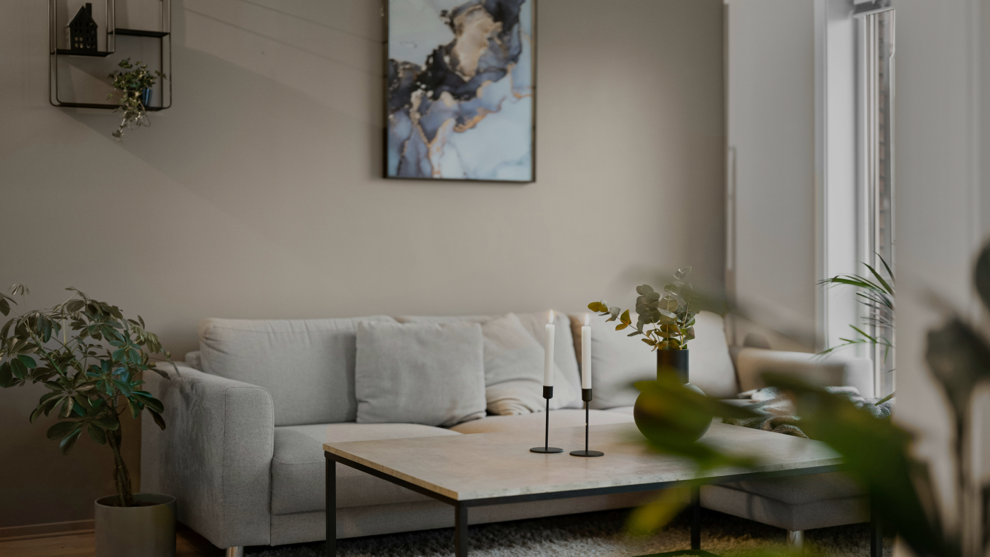 Warm minimalist living room with beige sofa