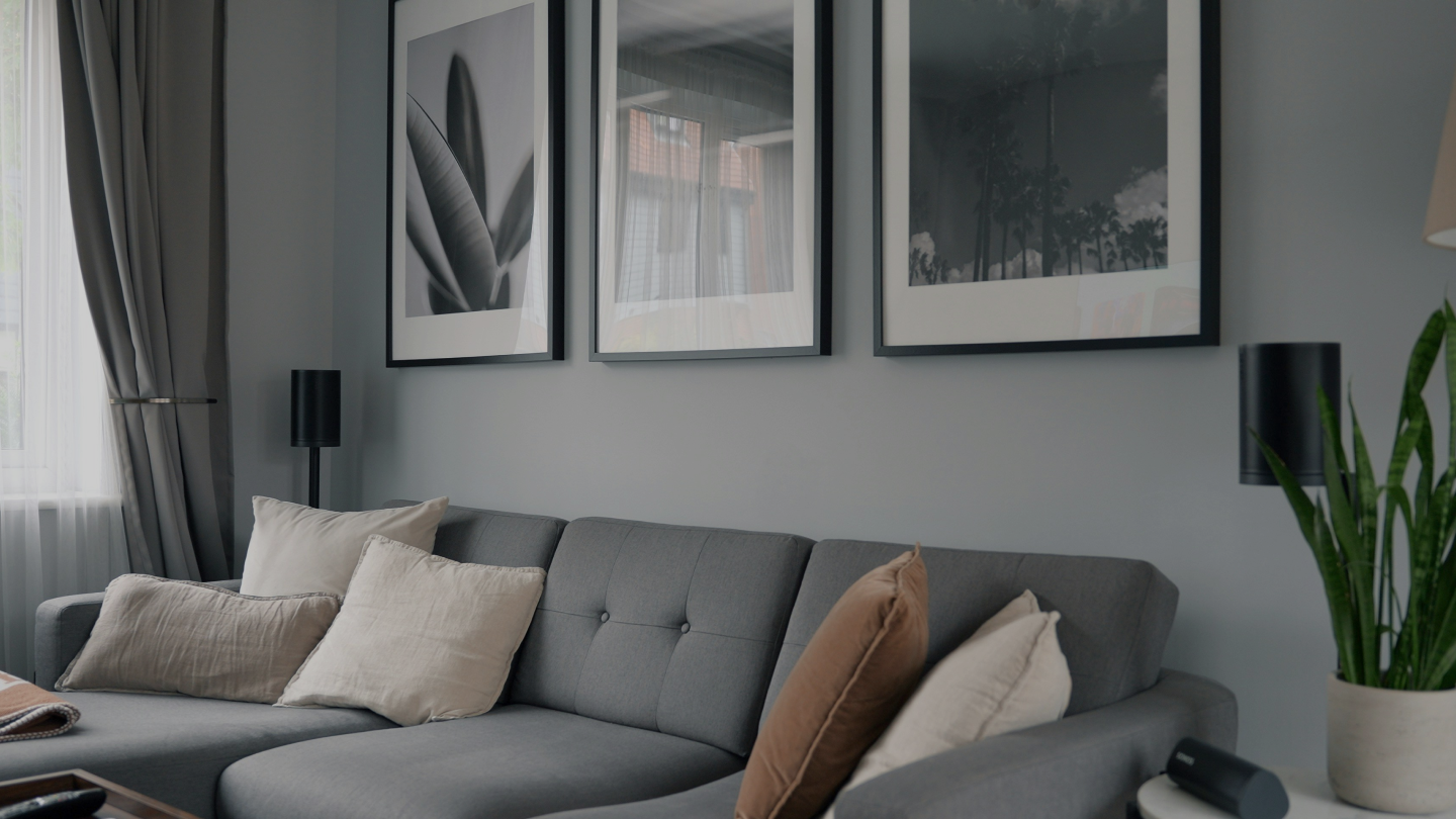 Grey living room with gallery wall frames